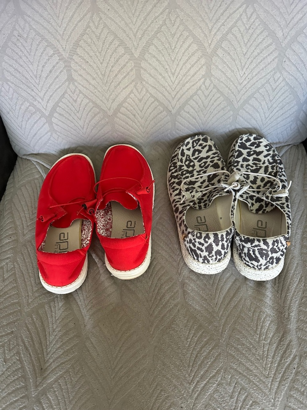 TWO pairs of Hey Dudes - black/cream Leopard print & red - Women's size 9